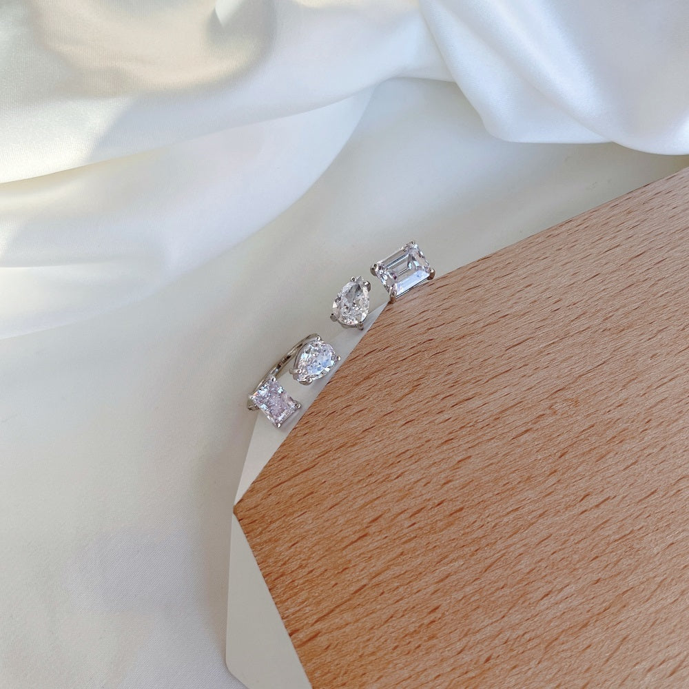 Pear & Emerald Open Ring in White Gold